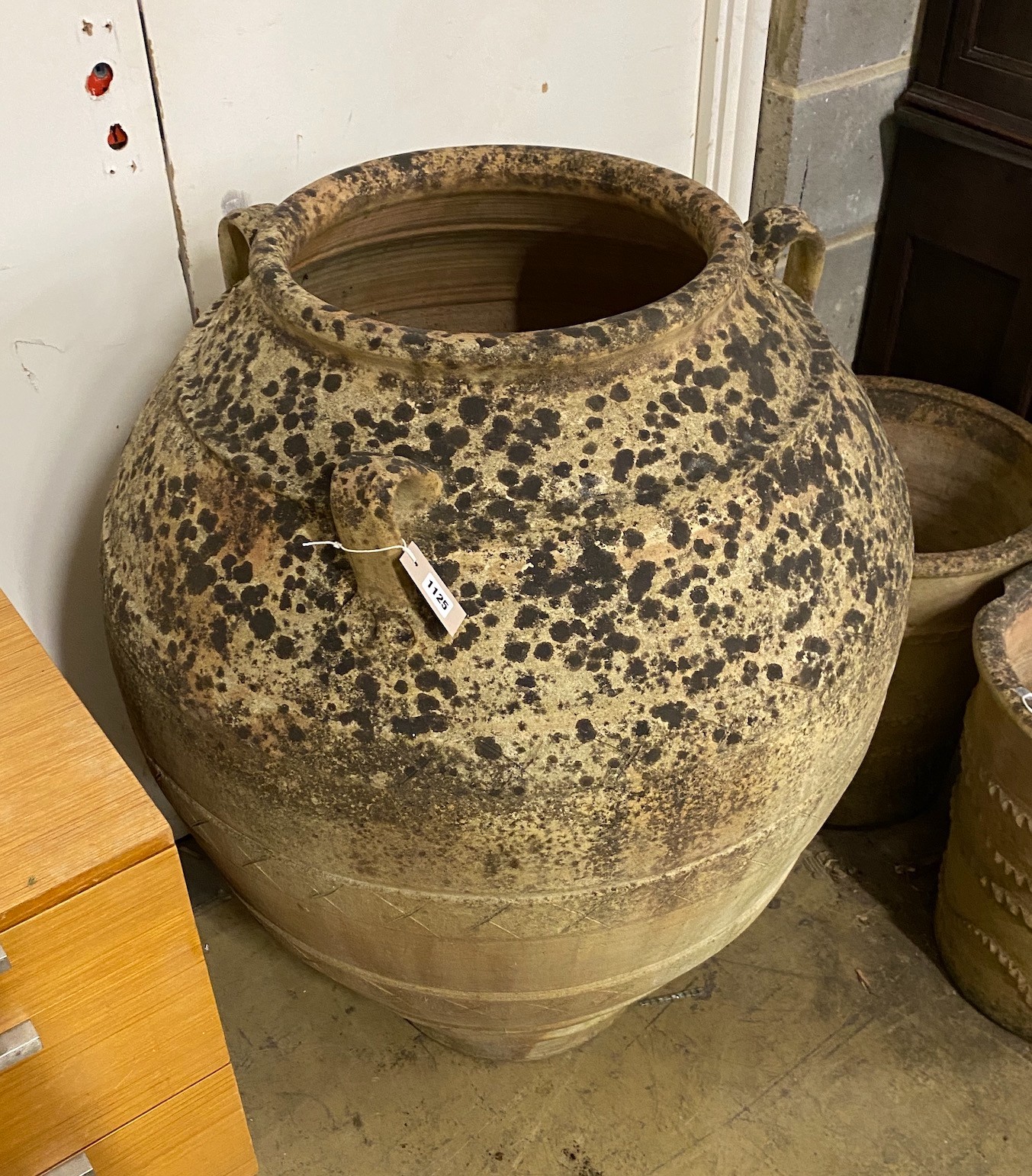 A Grecian style earthenware oil jar, height 100cm
